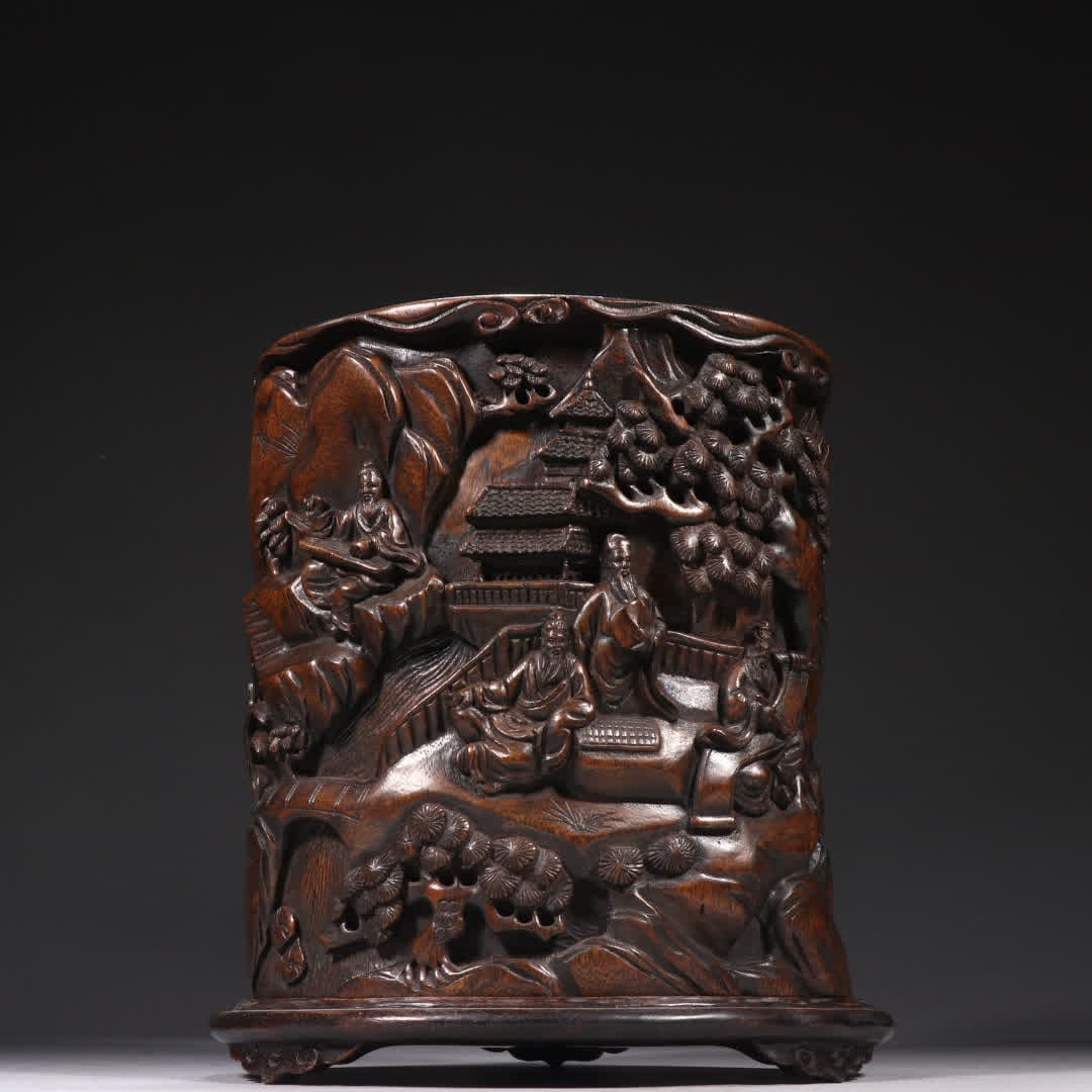 A Qing Dynasty agarwood character story pen holder (1 of 9)