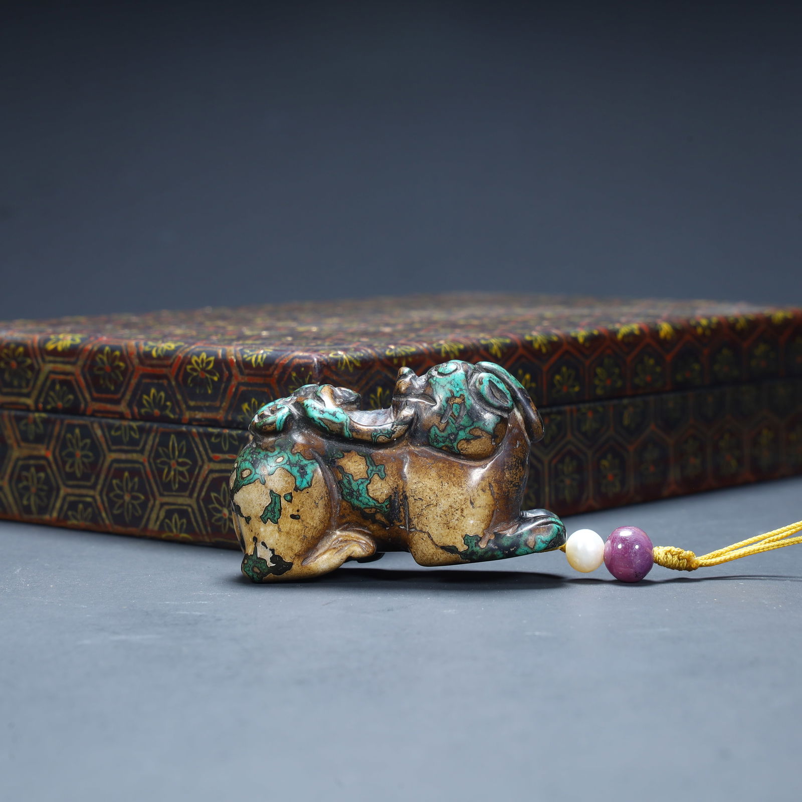 A piece of Qing Dynasty turquoise auspicious beast (child and female beast) handle piece (with: Qing Dynasty turquoise auspicious beast (child and female beast) handle piece (with brocade box) SIZE: H:3.5cm L:6cm W:2.5cm W:92g (The Dimensions Of All Batches Are Manually Measured.If You Need More