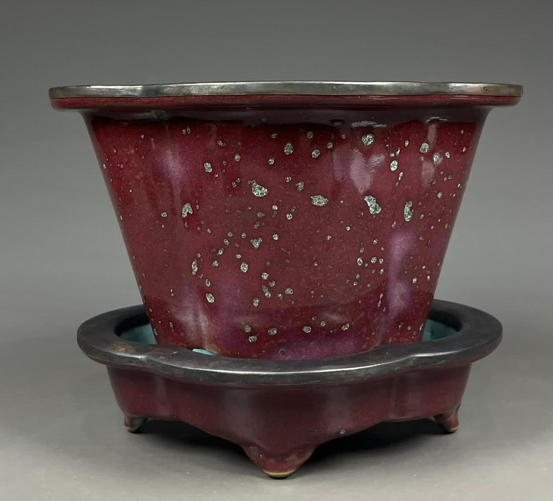 A Song Jun kiln rose red glaze inlaid with copper buckle begonia flower pot: Song Jun kiln rose red glaze inlaid with copper buckle begonia flower pot SIZE: H:18.5cm L:24cm W:18cm (The Dimensions Of All Batches Are Manually Measured.If You Need More Detailed Information, Pleas