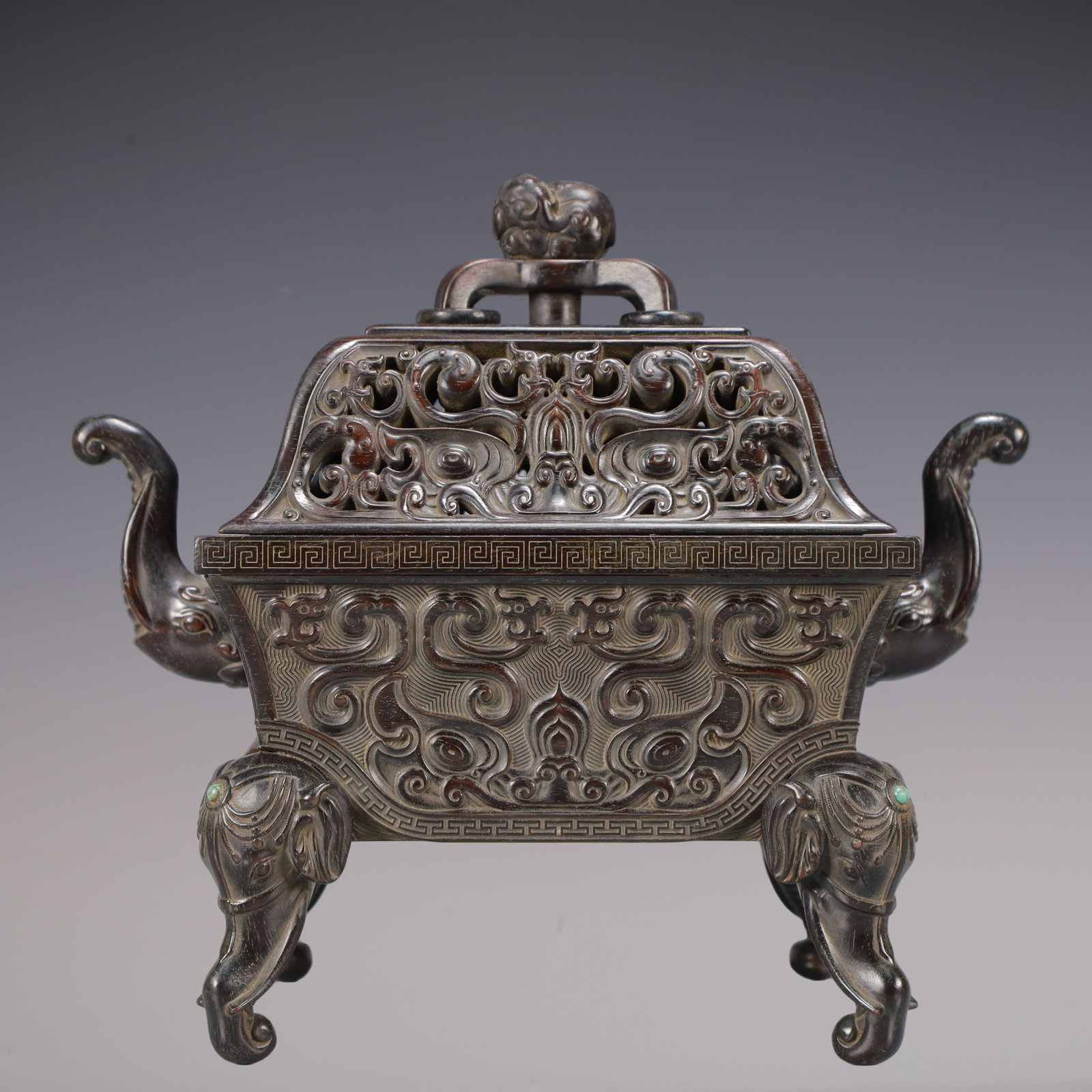 A Exquisite Zitanwood Beast-Face Pattern Double-Ears Censer: A Exquisite Zitanwood Beast-Face Pattern Double-Ears Censer Qing Dynasty, China Qianlong Six-character Mark Size:27cmx14cmx24.6cm Weight:1000g (The Dimensions Of All Batches Are Manually Measured.If Y
