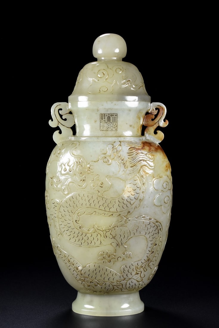 An Exquisite White Jade Dragon Pattern Double-Ears Vase: An Exquisite White Jade Dragon Pattern Double-Ears Vase Qing Dynasty, China Size:27cmx13cmx6.5cm Weight:589g (The Dimensions Of All Batches Are Manually Measured.If You Need More Detailed Information,