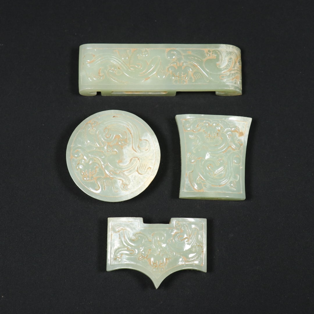 A Set of Fine White Jade Dragon Pattern Ornament: A Set of Fine White Jade Dragon Pattern Ornament Han Dynasty, China Size:4.9cmx1.3cm Size:9.1cmx2.6cmx1.3cm Size:4.4cmx4.1cmx1.3cm Size:5.2cmx3.6cmx1.3cm Weight:212.3g (The Dimensions Of All Batches A