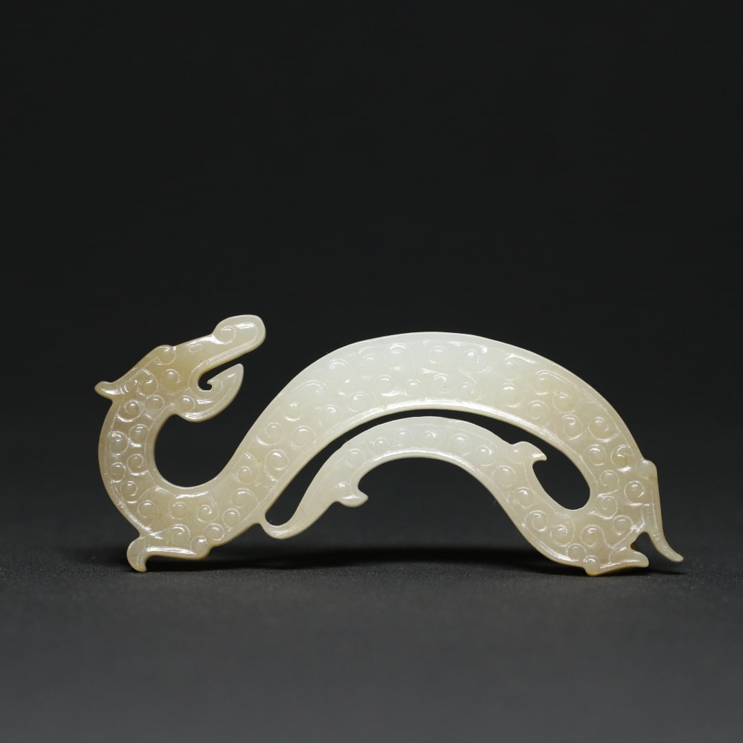 An Exquisite White Jade Dragon-Shaped Pendant (1 of 9)