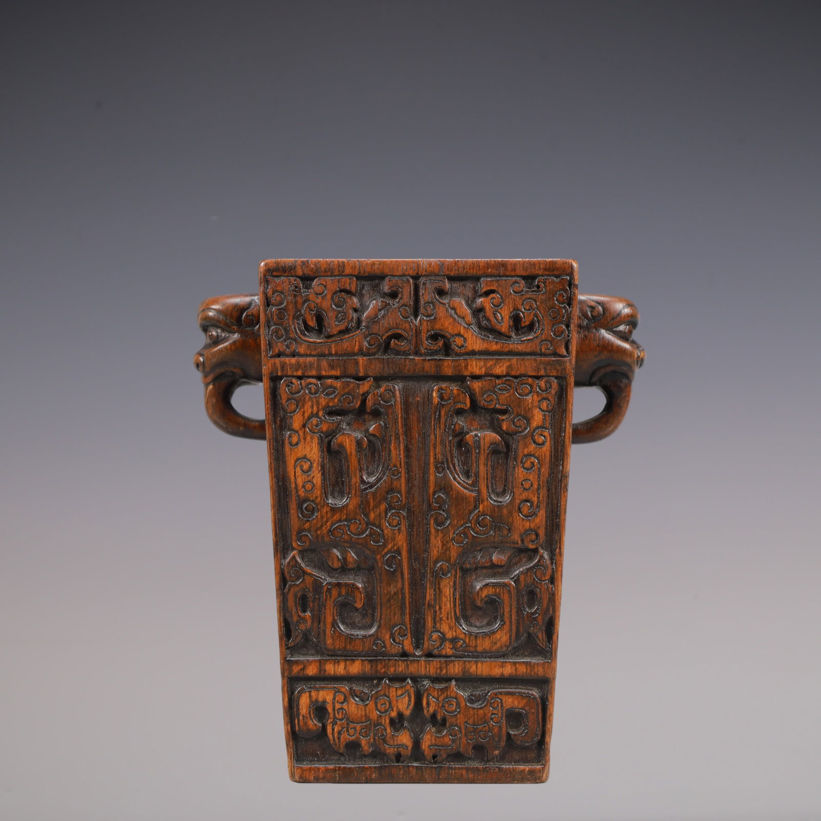 A Exquisite Eaglewood Beast-Face Pattern Double-Ears Brush Pot: A Exquisite Eaglewood Beast-Face Pattern Double-Ears Brush Pot Qing Dynasty, China Size:12cmx6.5cmx12.9cm Weight:150g (The Dimensions Of All Batches Are Manually Measured.If You Need More Detailed Inf