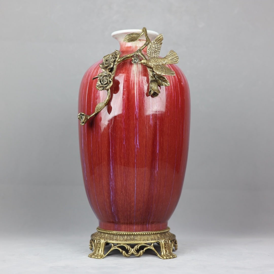 An Exquisite Flambe Glazed Inlaid Bronze Flower and Bird Pattern Vase: An Exquisite Flambe Glazed Inlaid Bronze Flower and Bird Pattern Vase Qing Dynasty, China Qianlong Six-character Mark Size:44cmx24cm (The Dimensions Of All Batches Are Manually Measured.If You Need Mo