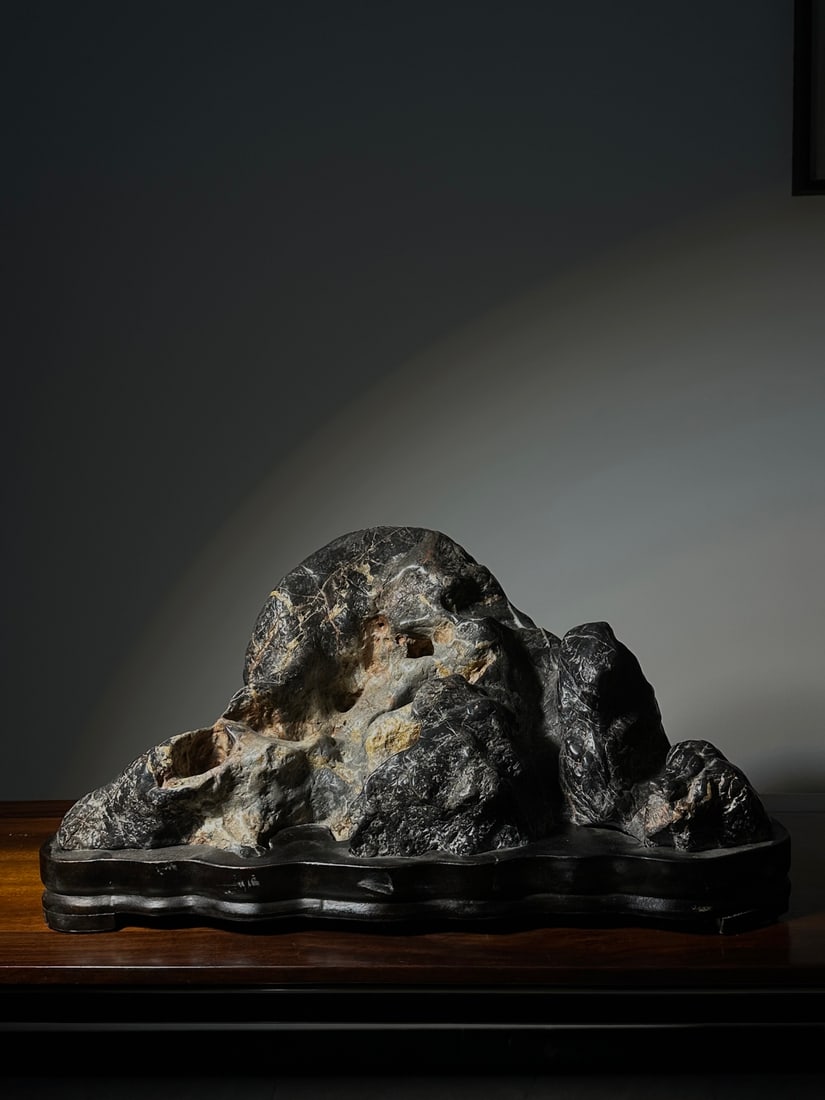 An Exquisite Taihu Stone Rockery Ornament: An Exquisite Taihu Stone Rockery Ornament Qing Dynasty, China Size:64cmx32cmx31cm (The Dimensions Of All Batches Are Manually Measured.If You Need More Detailed Information, Please Contact Our Custome