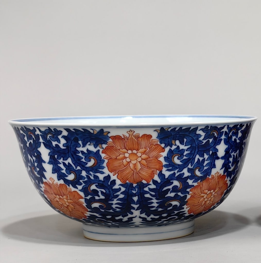 An Exquisite Blue and White Iron-Red Lotus Pattern Bowl: An Exquisite Blue and White Iron-Red Lotus Pattern Bowl Qing Dynasty, China Kangxi Six-character Mark Size:8.6cmx18.2cm (The Dimensions Of All Batches Are Manually Measured.If You Need More Detailed I