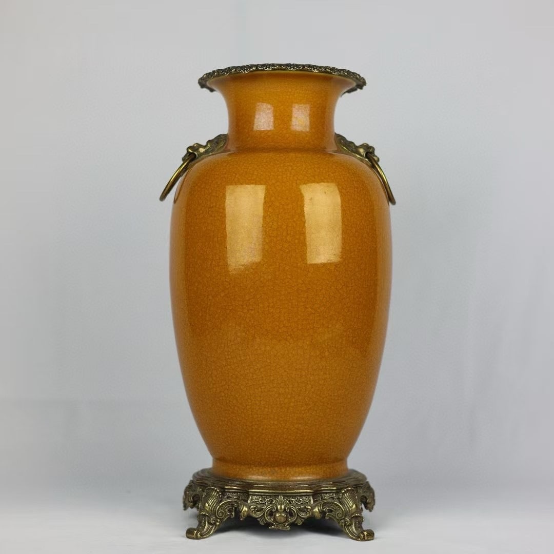 An Exquisite Yellow Glazed Inlaid Bronze Double-Ears Vase: An Exquisite Yellow Glazed Inlaid Bronze Double-Ears Vase Qing Dynasty, China Qianlong Six-character Mark Size:42cmx20cm (The Dimensions Of All Batches Are Manually Measured.If You Need More Detailed