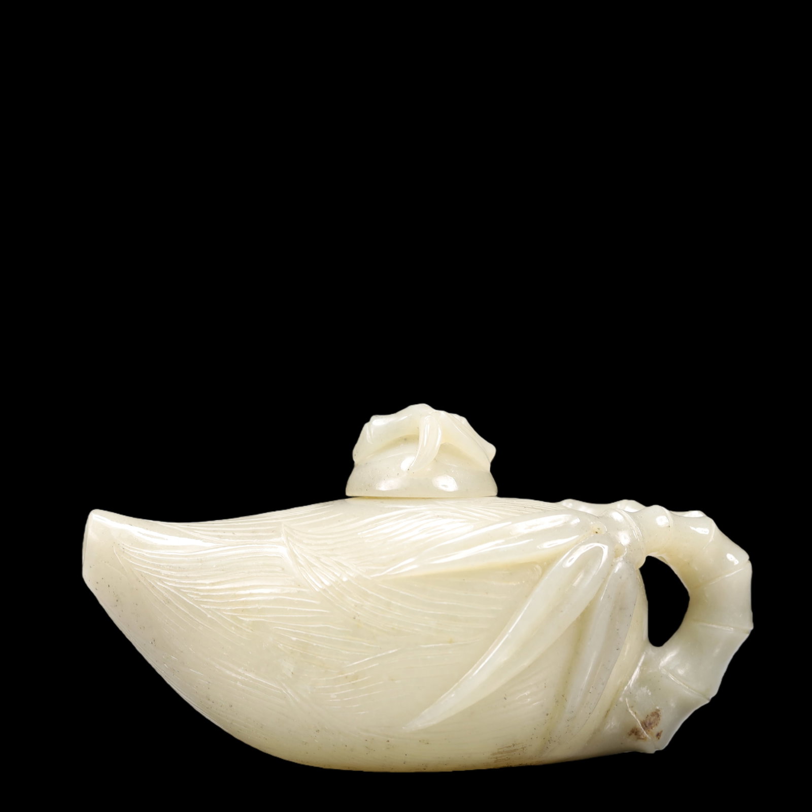 An Exquisite Green Jade Bamboo Pattern Teapot: An Exquisite Green Jade Bamboo Pattern Teapot Qing Dynasty, China Size:12cmx6cmx6.5cm Weight:187g (The Dimensions Of All Batches Are Manually Measured.If You Need More Detailed Information, Please Con