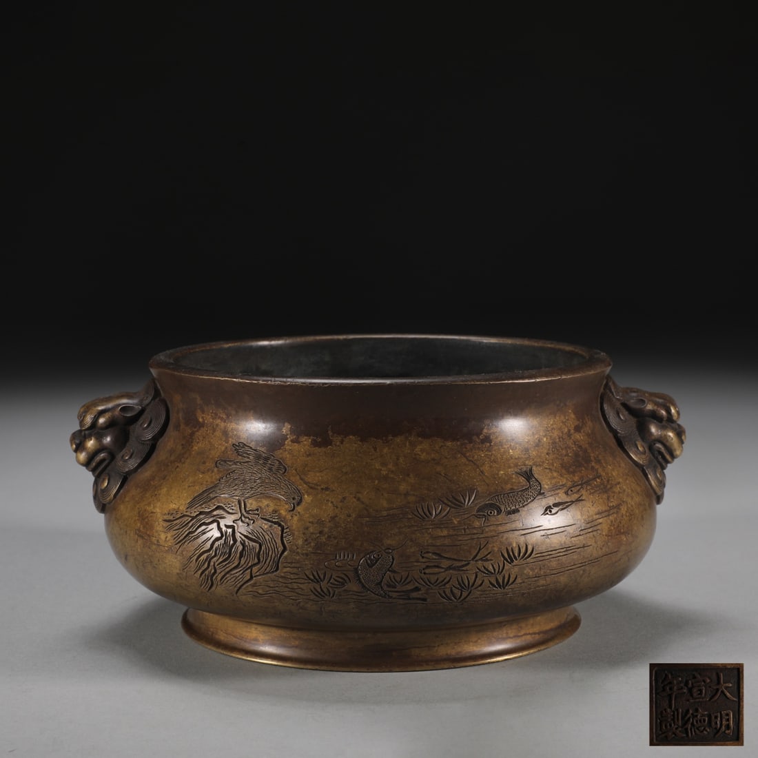 An Exquisite Bronze Fish and Lotus Pattern Double-Ears Censer: An Exquisite Bronze Fish and Lotus Pattern Double-Ears Censer Ming Dynasty, China Xuande Six-character Mark Size:7.7cmx15.8cm Weight:1650g (The Dimensions Of All Batches Are Manually Measured.If You N