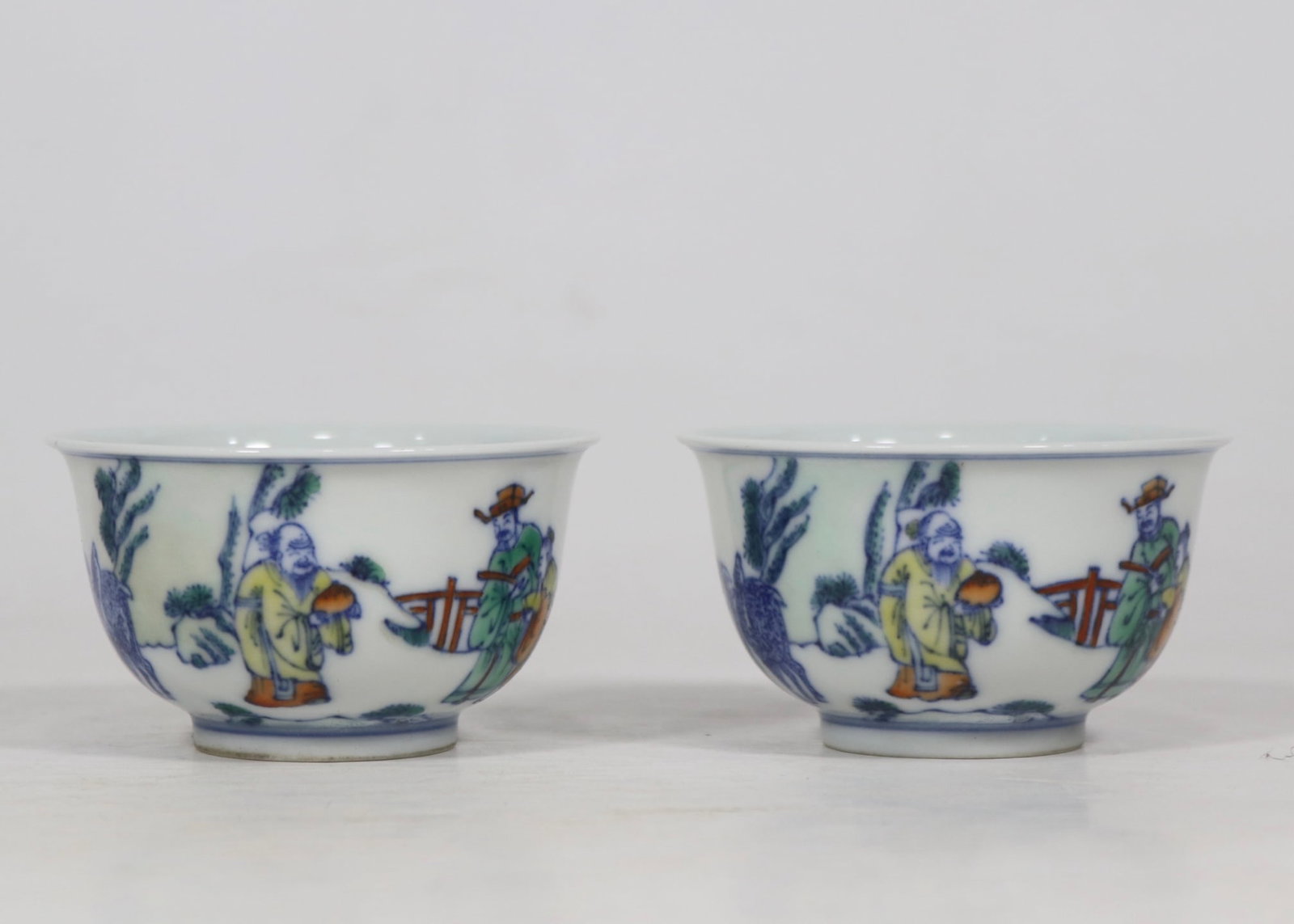 A Pair of Exquisite Doucai Character and Story Pattern Cup: A Pair of Exquisite Doucai Character and Story Pattern Cup Qing Dynasty, China Yongzheng Six-character Mark Size:4.6cmx8cm (The Dimensions Of All Batches Are Manually Measured.If You Need More Detaile