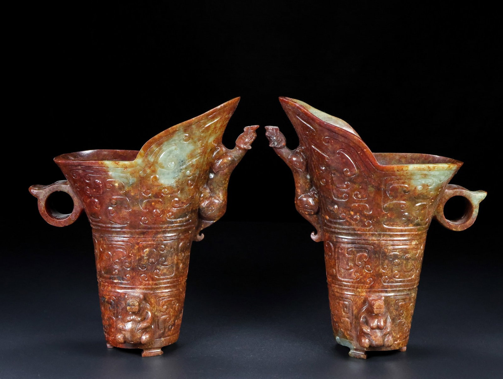 A Pair of Exquisite White Jade Auspicious Beast Pattern Goblet: A Pair of Exquisite White Jade Auspicious Beast Pattern Goblet Han Dynasty, China Size:17cmx16cmx9cm Weight:1129g (The Dimensions Of All Batches Are Manually Measured.If You Need More Detailed Informa