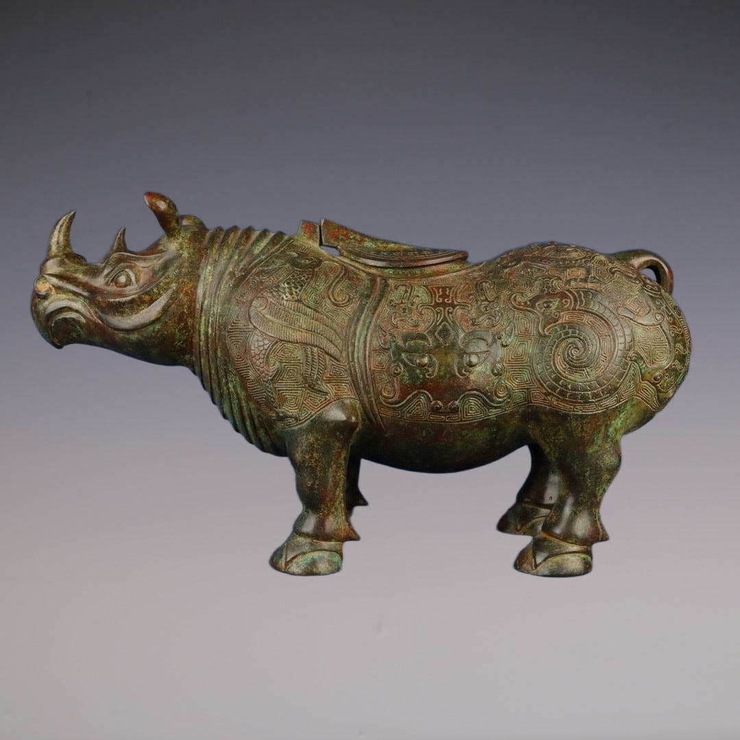 An Exquisite Bronze Beast-Face Pattern Rhinoceros-Shaped Censer (1 of 9)
