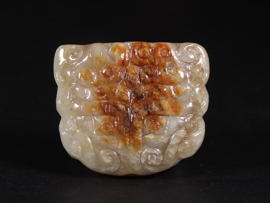 An Exquisite White Jade Beast-Face Pattern Ornament: An Exquisite White Jade Beast-Face Pattern Ornament Han Dynasty, China Size:6.2cmx5.2cmx1.8cm Weight:124g (The Dimensions Of All Batches Are Manually Measured.If You Need More Detailed Information, Pl