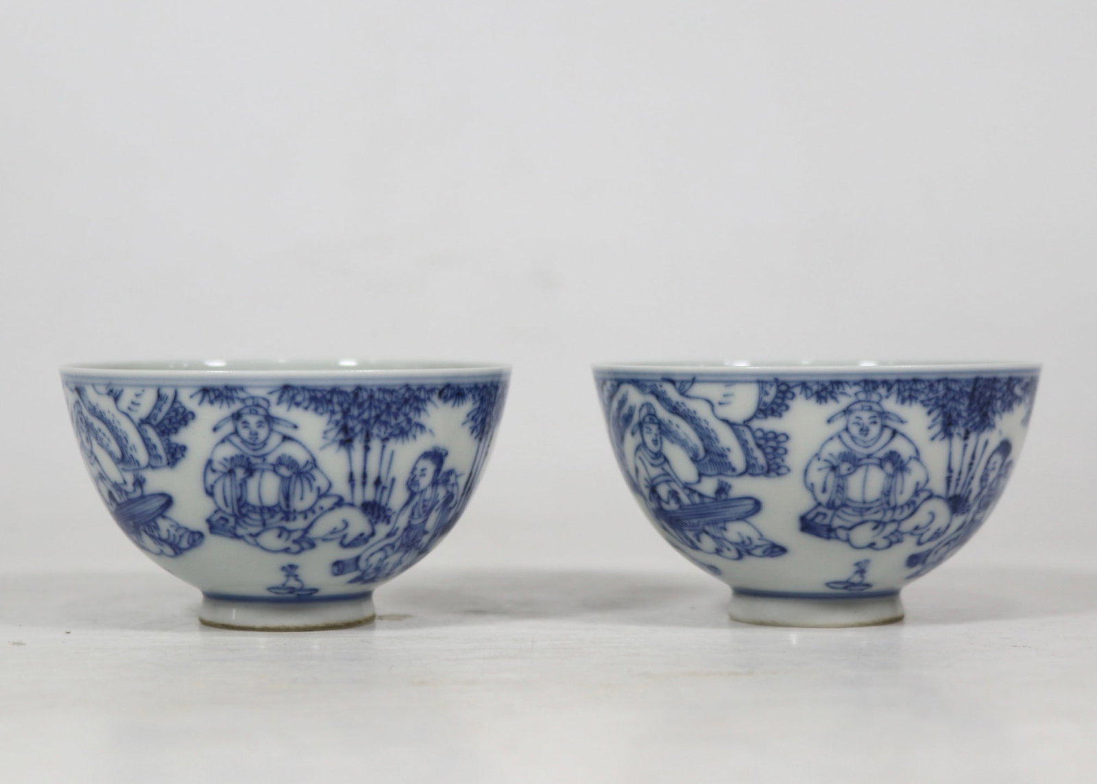 A Pair of Exquisite Blue and White Character and Story Pattern Cup: A Pair of Exquisite Blue and White Character and Story Pattern Cup Qing Dynasty, China Kangxi Six-character Mark Size:4.2cmx7.5cm (The Dimensions Of All Batches Are Manually Measured.If You Need More