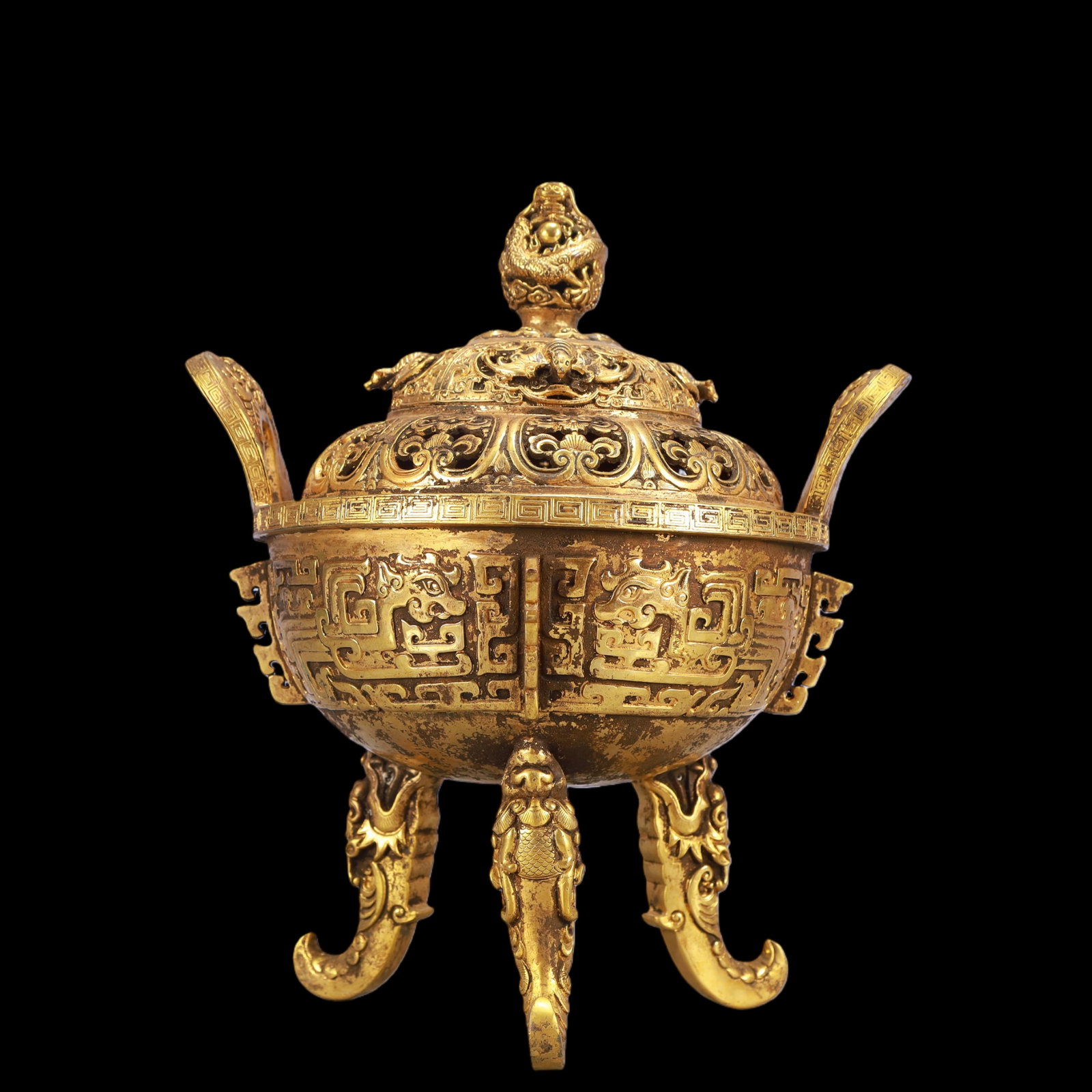 A Exquisite Gilt Bronze Lotus Pattern Dragon Pattern Double-Ears and Tripod Censer: A Exquisite Gilt Bronze Lotus Pattern Dragon Pattern Double-Ears and Tripod Censer Ming Dynasty, China Yongle Six-character Mark Size:22.5cmx18cmx27cm Weight:2550g (The Dimensions Of All Batches Are M