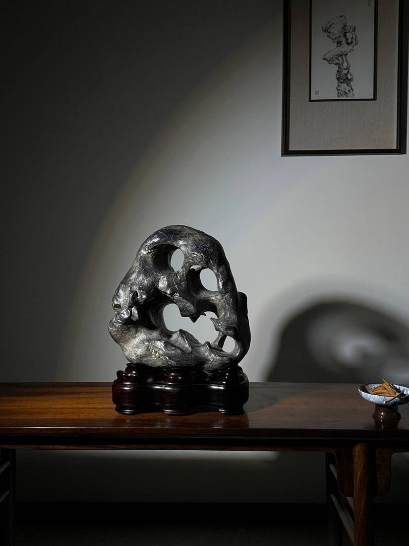 An Exquisite Taihu Stone Ornament: An Exquisite Taihu Stone Ornament Qing Dynasty, China Size:46cmx34cmx24cm (The Dimensions Of All Batches Are Manually Measured.If You Need More Detailed Information, Please Contact Our Customer Servic