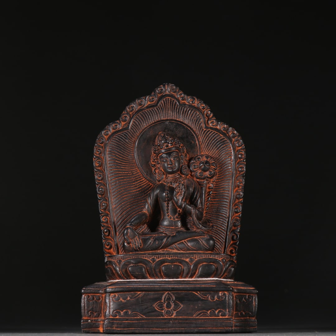 An Exquisite Black Stone Statue of Tara: An Exquisite Black Stone Statue of Tara Qing Dynasty, China Size:17.5cmx11.5cm Weight:1124.3g (The Dimensions Of All Batches Are Manually Measured.If You Need More Detailed Information, Please Contact