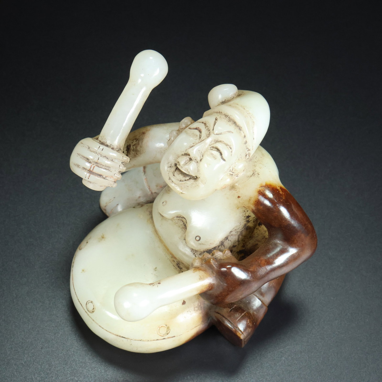 An Exquisite White Jade Figure Ornament: An Exquisite White Jade Figure Ornament Han Dynasty, China Size:7.4cmx8cmx8.6cm Weight:476g (The Dimensions Of All Batches Are Manually Measured.If You Need More Detailed Information, Please Contact O