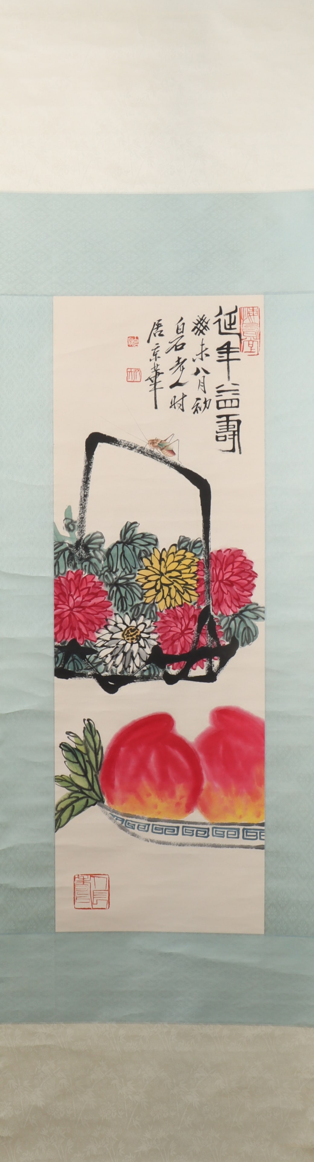 A Chinese Vertical Scroll Ink Painting of Flower and Fruit on Paper: A Chinese Vertical Scroll Ink Painting of Flower and Fruit on Paper Qi baishi Size:103cmx34cm (The Dimensions Of All Batches Are Manually Measured.If You Need More Detailed Information, Please Contact