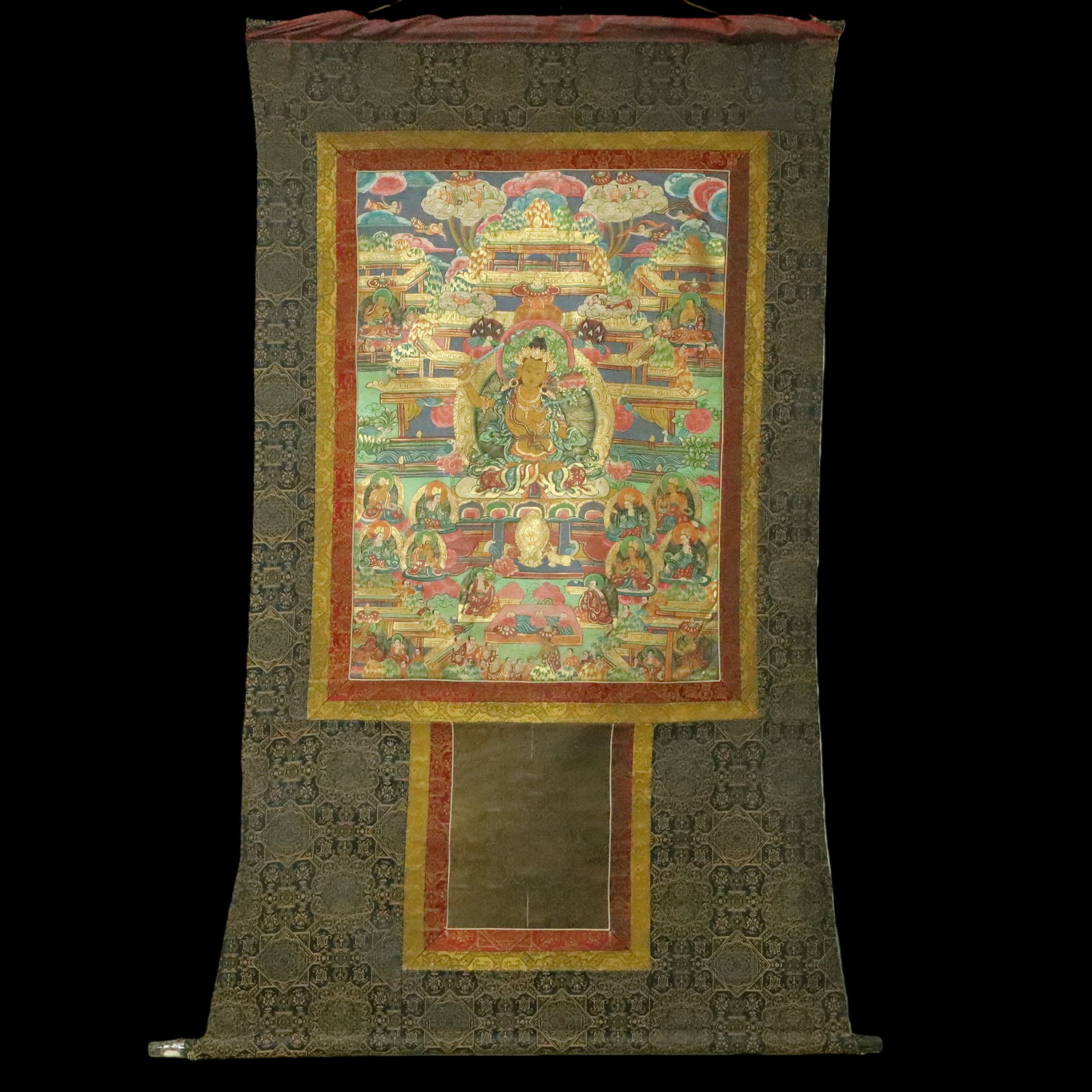 An Exquisite Brocade Painted Color Statue of Manjusri Tangka: An Exquisite Brocade Painted Color Statue of Manjusri Tangka Ming Dynasty, China Size:97cmx160cm (The Dimensions Of All Batches Are Manually Measured.If You Need More Detailed Information, Please
