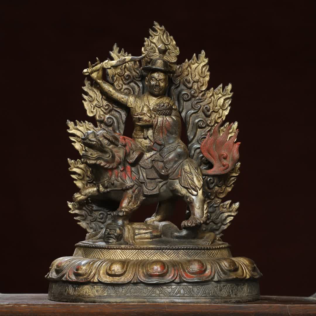A Qing Dynasty bronze gold protector statue (1 of 9)