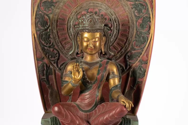 A gilded Buddha statue - 2