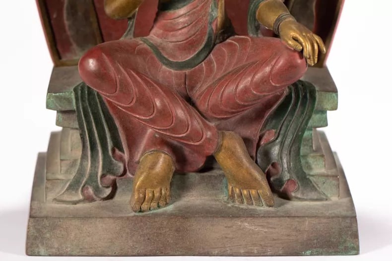 A gilded Buddha statue - 4