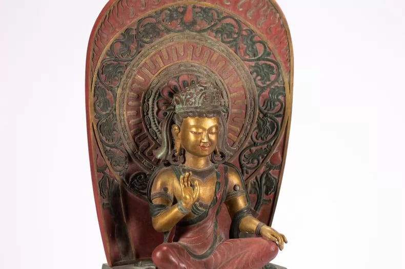 A gilded Buddha statue - 7