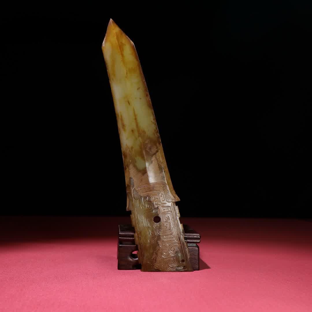 A Han Dynasty jade god pattern handle (1 of 9)