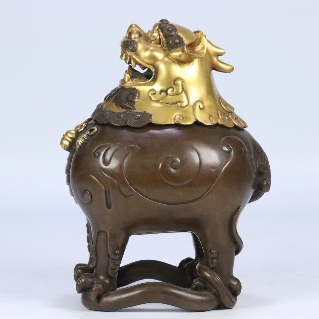 A copper partially gilded beast incense burner (1 of 9)