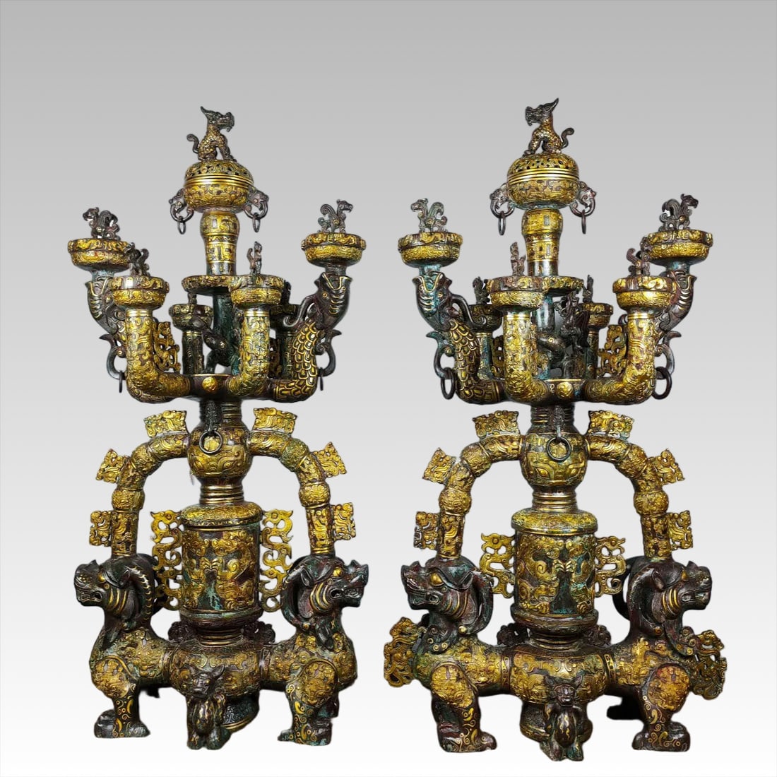 A pair of Warring States bronze Cuojin double beast lamps: A pair of bronze and golden twin beast lamps in the Warring States period SIZE: H: 110cm W: 59cm Total W: 63kg (The Dimensions Of All Batches Are Manually Measured.If You Need More Detailed Informatio
