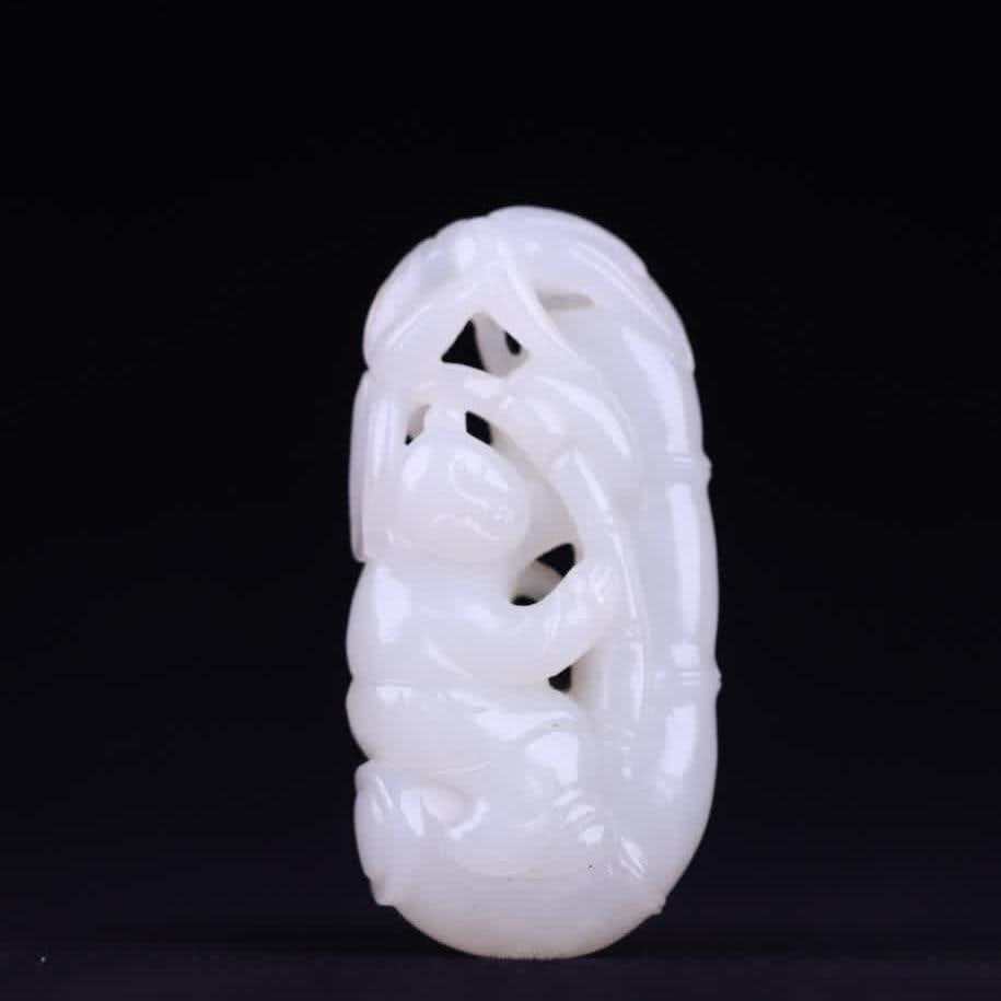 A piece of Qing Dynasty Hetian jade boy holding bamboo (1 of 9)