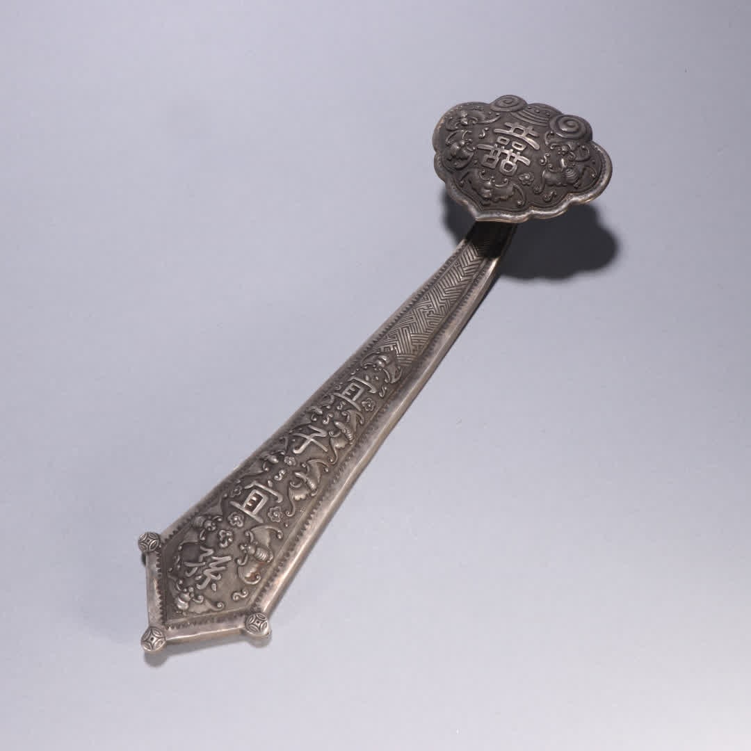 A Qing Dynasty copper gilt silver double happy pattern ruyi: Qing Dynasty copper gilt silver double happy pattern ruyi SIZE: L:32cm W:10cm W:517.6g (The Dimensions Of All Batches Are Manually Measured.If You Need More Detailed Information, Please Contact Our Cu
