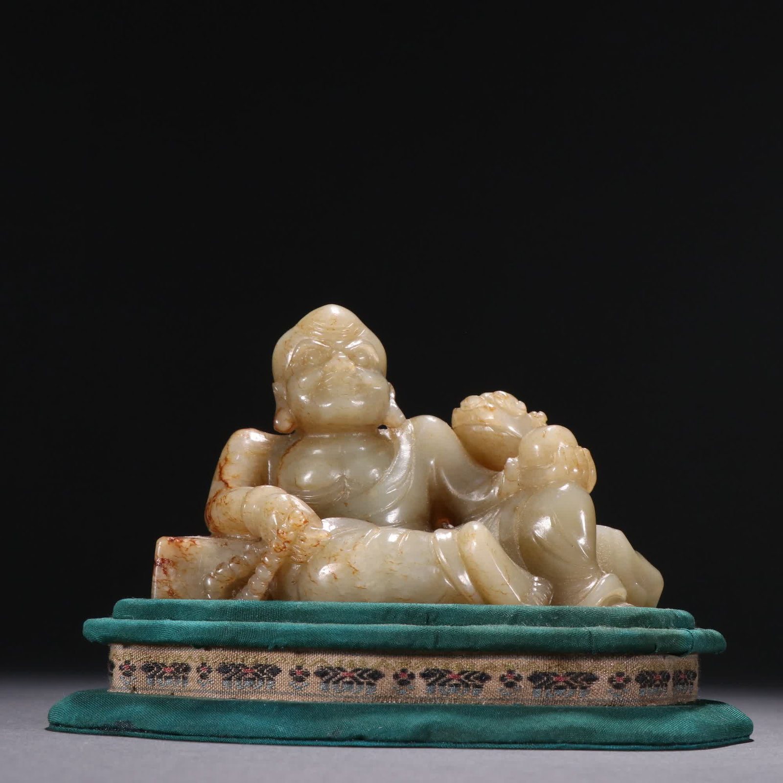 A Qing Dynasty Hetian jade seed material lion Arhat ornament: Qing Dynasty Hetian jade seed material play lion Arhat ornament SIZE: H:6.5cm W:10cm W:428g (The Dimensions Of All Batches Are Manually Measured.If You Need More Detailed Information, Please Contact O