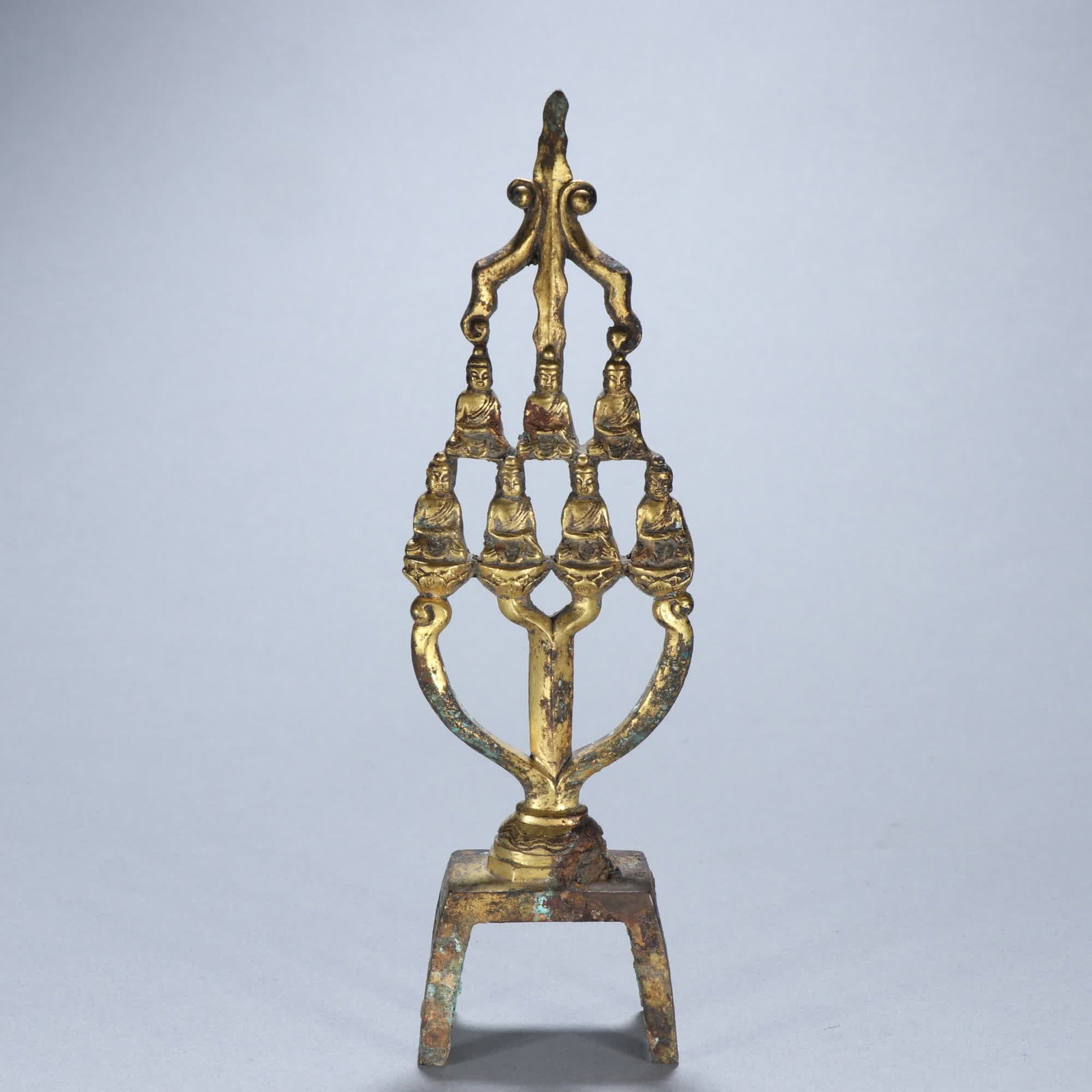 A Northern Wei bronze gilt seven-star bench Buddha: Northern Wei bronze gilt seven-star bench Buddha SIZE: H:18.6cm W:5.4cm W:223.4g (The Dimensions Of All Batches Are Manually Measured.If You Need More Detailed Information, Please Contact Our Customer