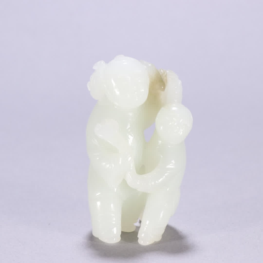 A Qing Dynasty Hetian jade boy carving (1 of 9)
