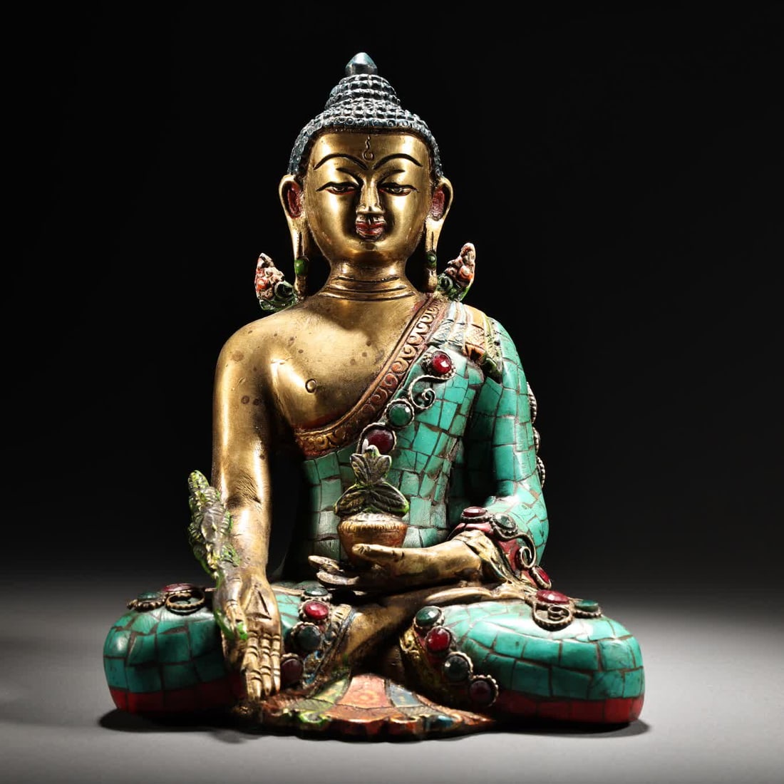 A Qing Dynasty statue of the Tantric Medicine Buddha with gemstones painted with gold painting (1 of 9)