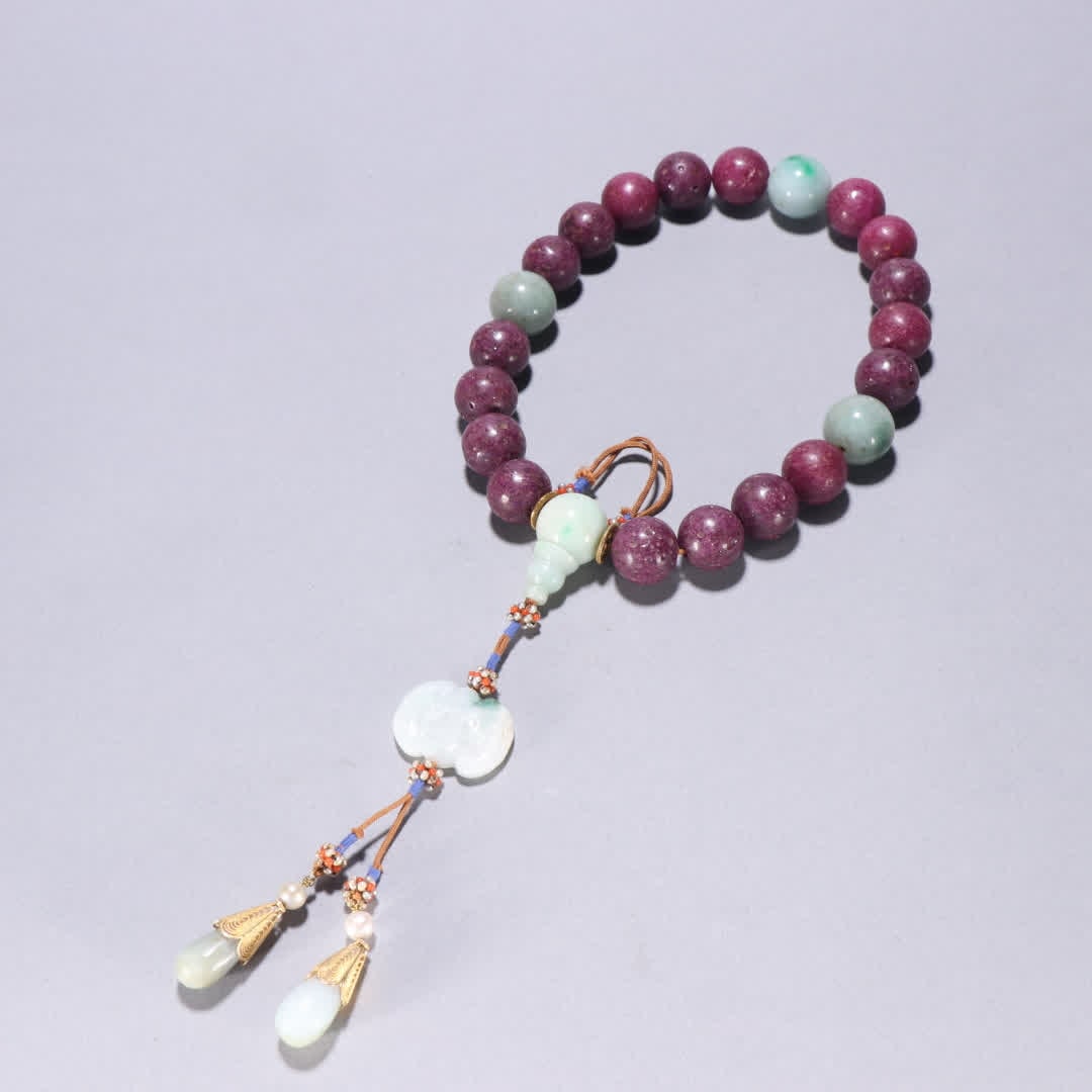 A piece of Qing Dynasty ruby held by eighteen sons (1 of 9)