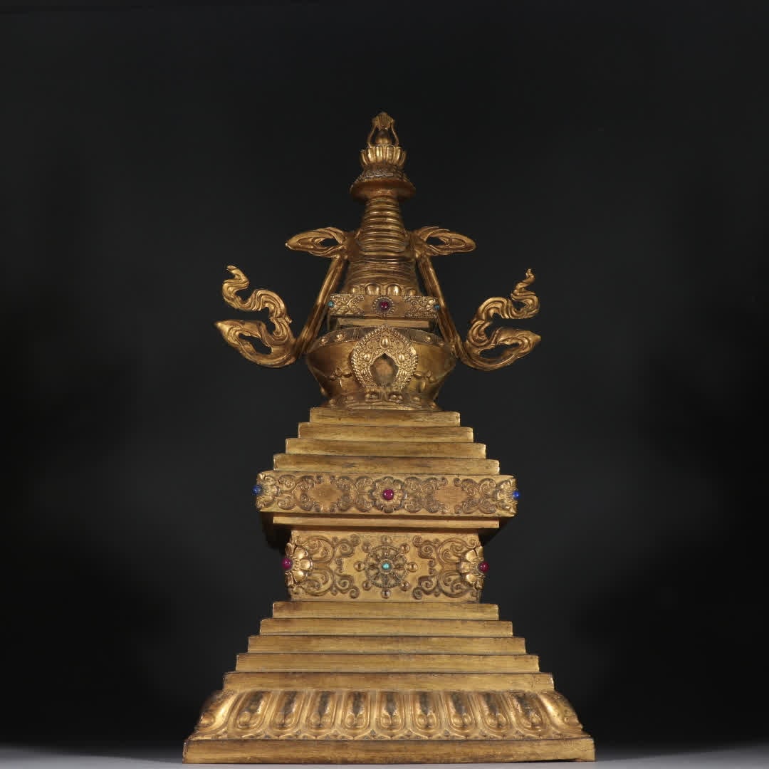 A Tang copper gilt pagoda: Tang copper gilt pagoda SIZE: H:40.2cm W:20.5cm W:6.3kg (The Dimensions Of All Batches Are Manually Measured.If You Need More Detailed Information, Please Contact Our Customer Service Before Bidding.)