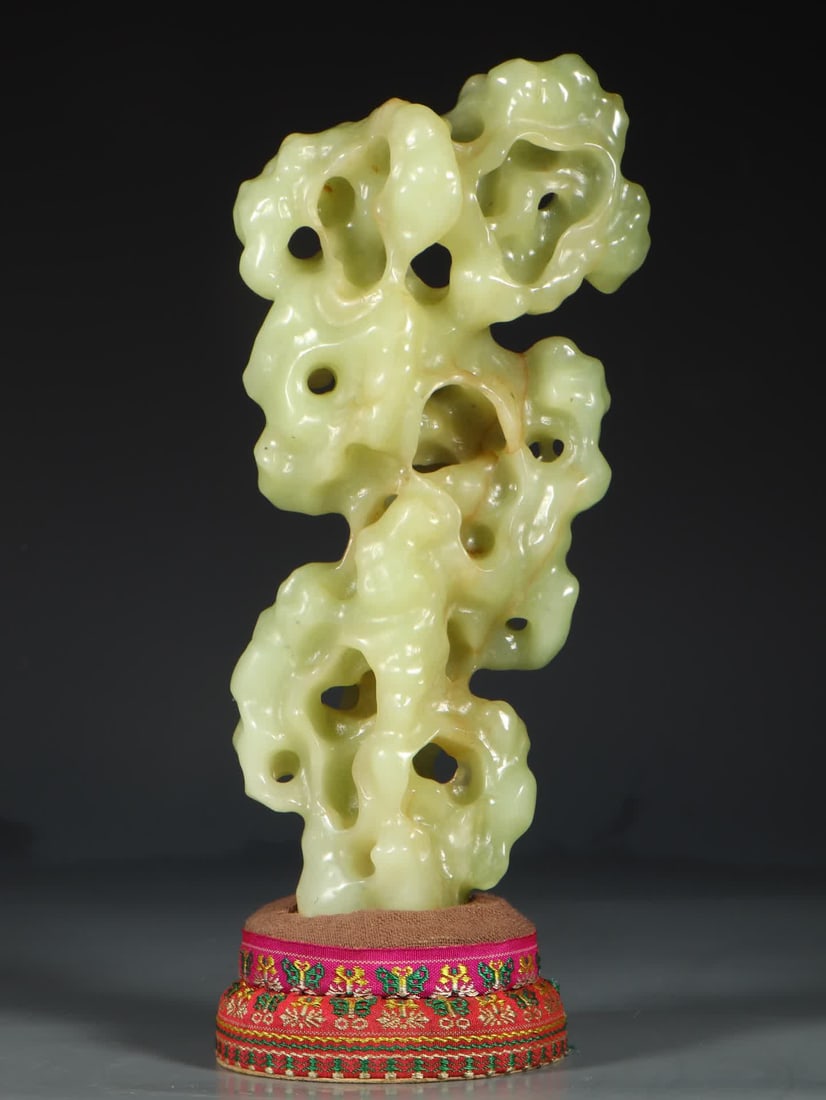 A Taihu Lake Shishanzi ornament carved by Hetian jade in the Qing Dynasty: Qing Dynasty Hetian jade carving Taihu Lake Shishanzi ornament SIZE: L:10.4cm W:6.1cm H:22.5cm W:942g (The Dimensions Of All Batches Are Manually Measured.If You Need More Detailed Information, Please