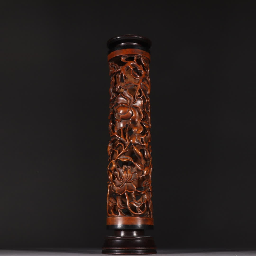 A Qing Dynasty sandalwood entwined pattern incense tube (1 of 9)