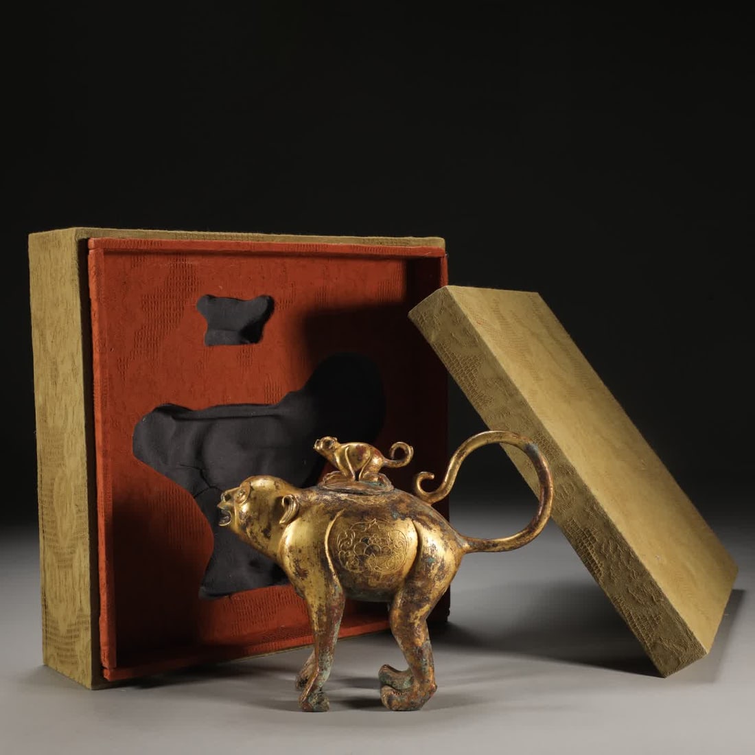 A Ming Dynasty copper gilt mother monkey pot (1 of 9)