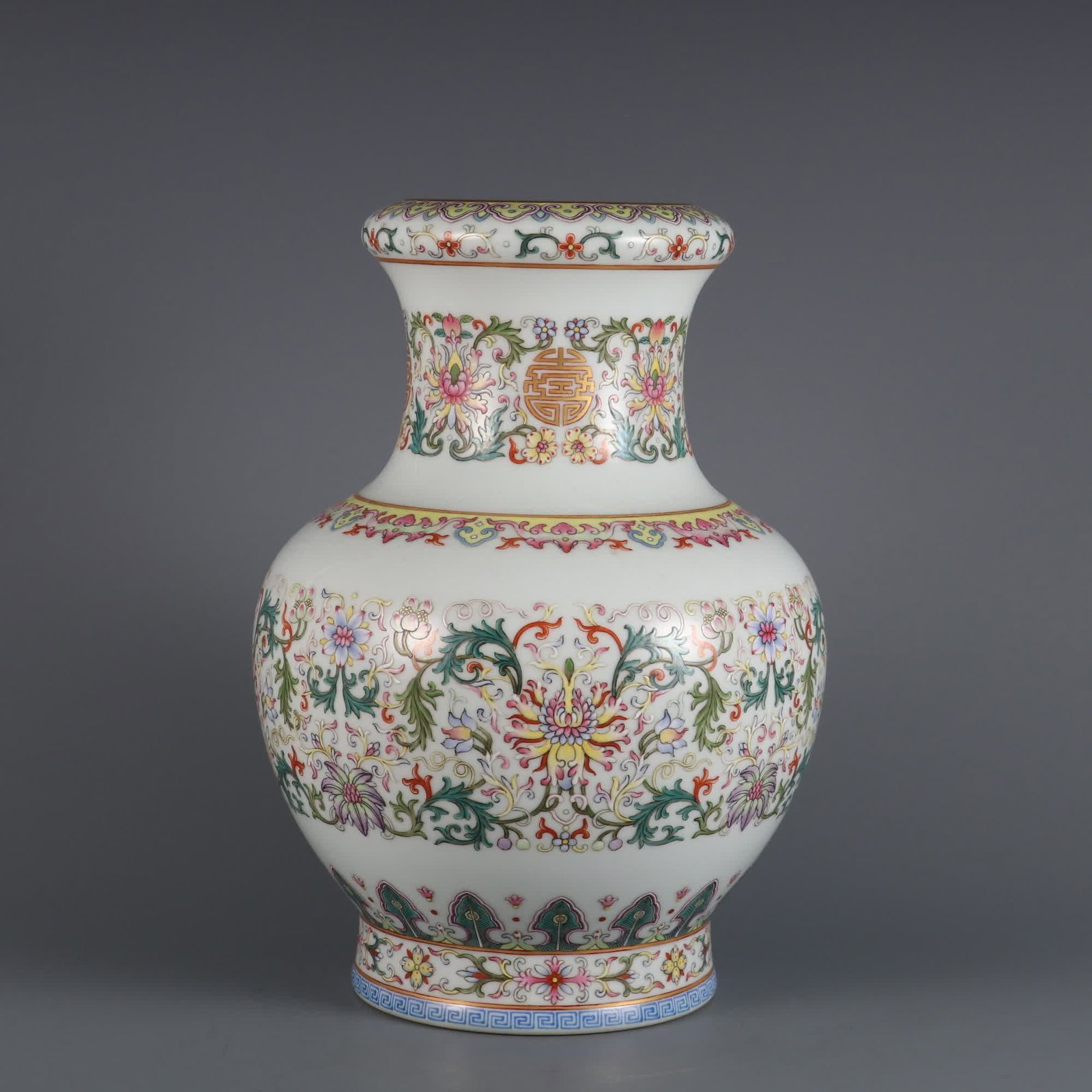 A pastel entwined lotus with gold shou character pattern vase made in the Qianlong period of the (1 of 9)