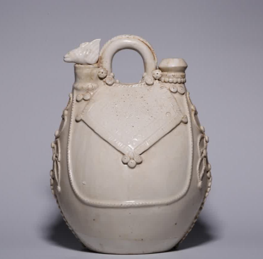 A Song Dynasty Ding kiln horseback pot (1 of 8)