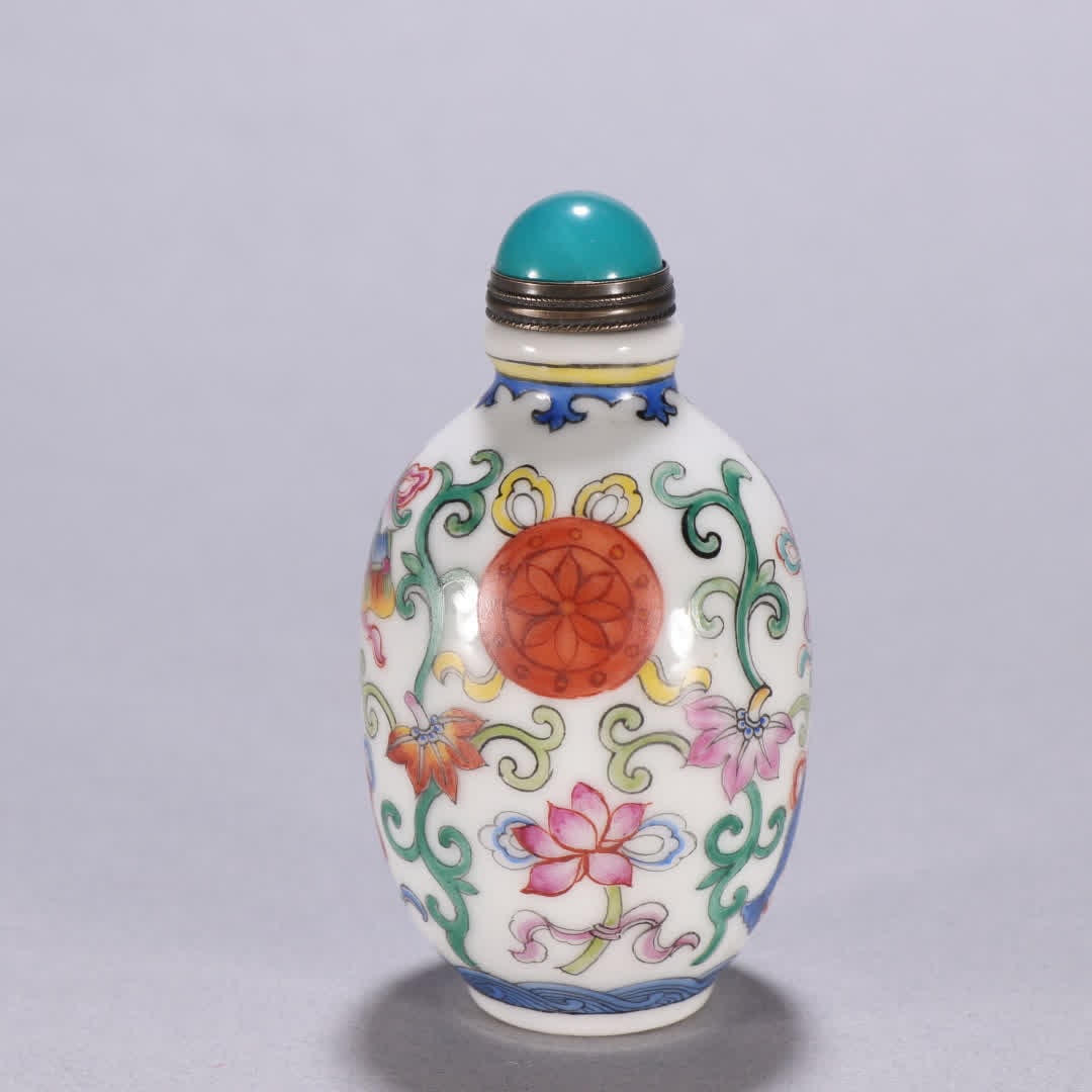 A Qing Dynasty pastel entwined lotus treasure flower snuff bottle: Qing Dynasty pastel entwined lotus treasure flower snuff bottle SIZE: H:7.9cm W:4.3cm (The Dimensions Of All Batches Are Manually Measured.If You Need More Detailed Information, Please Contact Our Cus