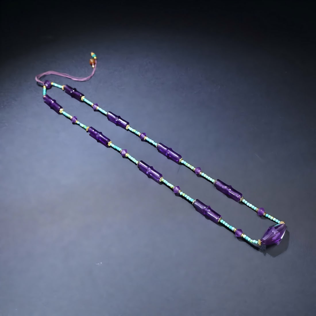 A Qing Dynasty amethyst with a turquoise necklace: Qing Dynasty amethyst with turquoise necklace SIZE: Bamboo 29x10mm W: 46g (The Dimensions Of All Batches Are Manually Measured.If You Need More Detailed Information, Please Contact Our Customer Servic