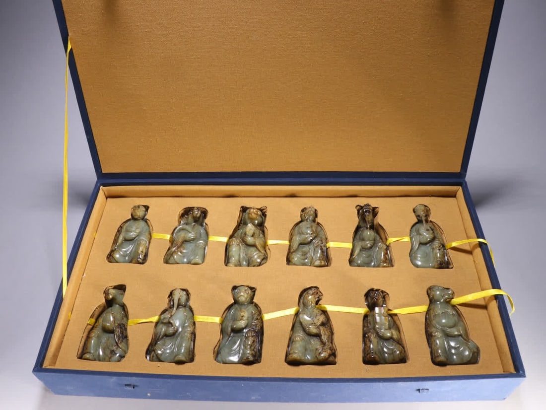 A set of Hetian jade zodiac ornaments: Qing Dynasty Hetian jade zodiac ornaments SIZE: H: 8.9cm W: 5.1cm Single W: 165.8g (The Dimensions Of All Batches Are Manually Measured.If You Need More Detailed Information, Please Contact Our Custom