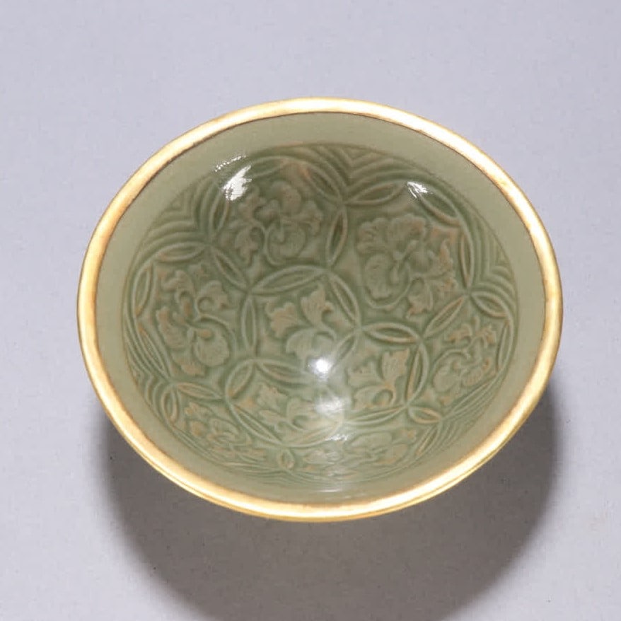 A Song Yaozhou kiln bag golden tea cup: Song Yaozhou kiln bag golden tea cup SIZE: H:4.2cm W:10.1cm (The Dimensions Of All Batches Are Manually Measured.If You Need More Detailed Information, Please Contact Our Customer Service Before Biddi