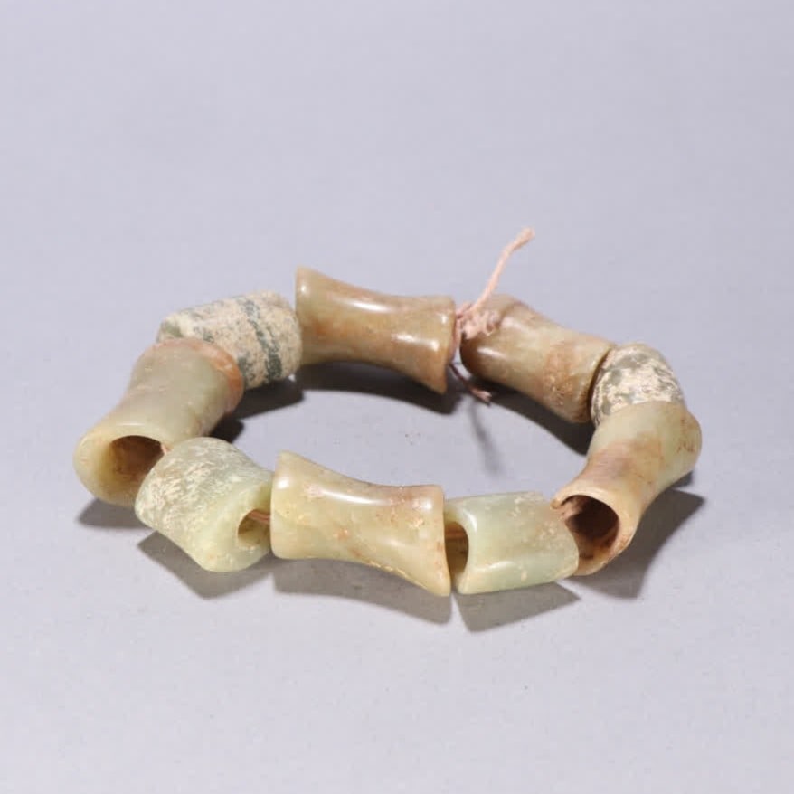A piece of Hongshan culture river grinding jade bone beaded bracelet: Hongshan culture river mill jade bone beaded bracelet SIZE: W:3x1.8cm W:93.2g (The Dimensions Of All Batches Are Manually Measured.If You Need More Detailed Information, Please Contact Our Customer Se
